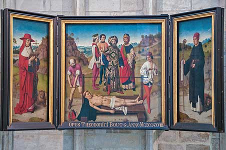 ルーヴェンの聖ペテロ教会周歩廊の「聖エラスムスの殉教」の三連祭壇画　Collegiale Sint-Pieterskerk